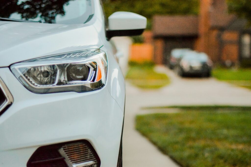 the front of a blue sedan